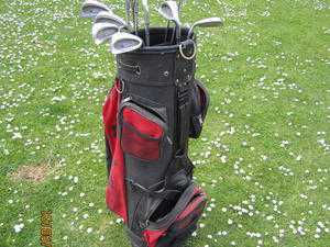 Complete set of Golf Clubs, bag and other golfing items.