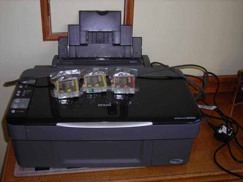 Computer- printer amp scanner with spare ink cartridges