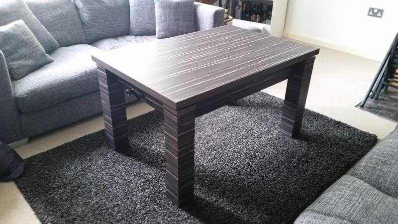 Convertible coffee table to dining table