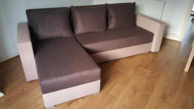 Corner sofa bed. Brand new. Brown colour  free delivery