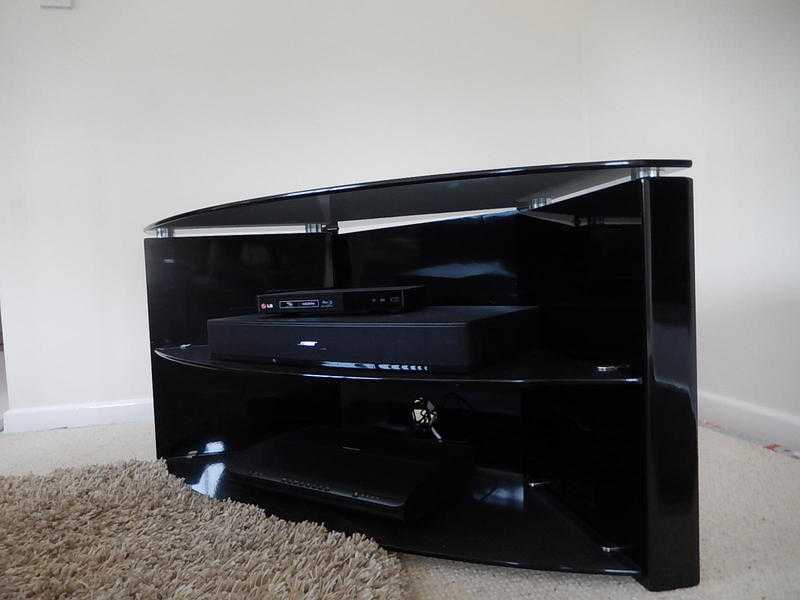 Corner TV Stand. Black. Two Shelves. 110cmW. 43cmD. 50cmH. Solid sides and back. VGC. 25