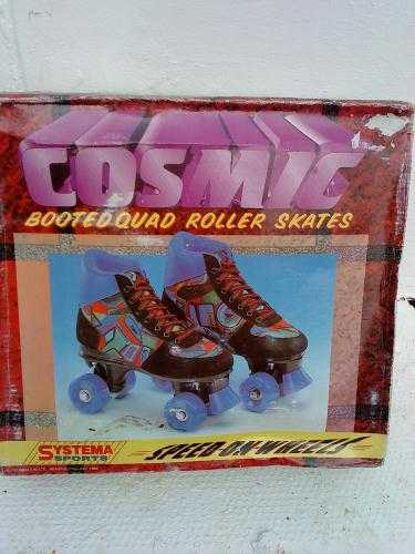COSMIC QUAD BOOTED ROLLER SKATES BRAND NEW SIZE FOUR.still packaged ideal girl or boy