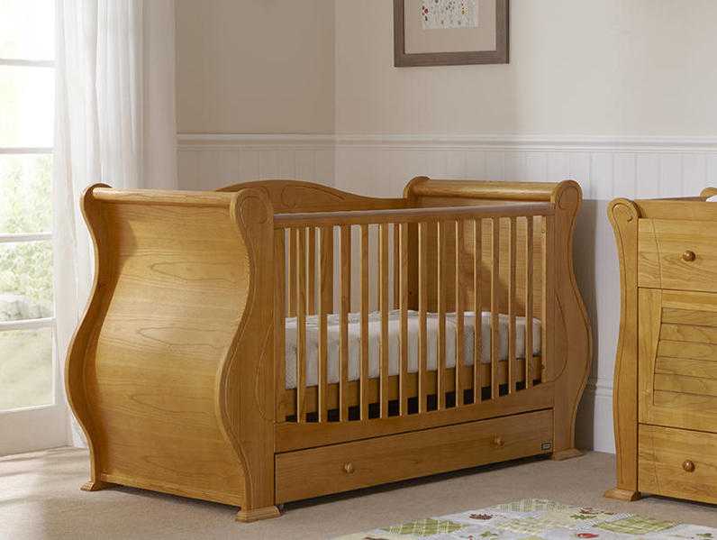 Cot Bed, well made designer cot turns into bed