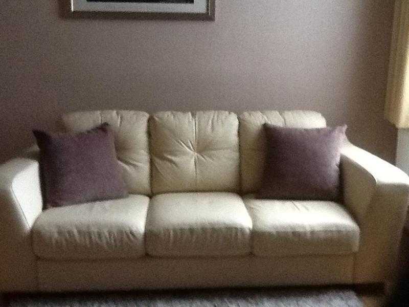 Cream leather sofas 3 and 2 seaters