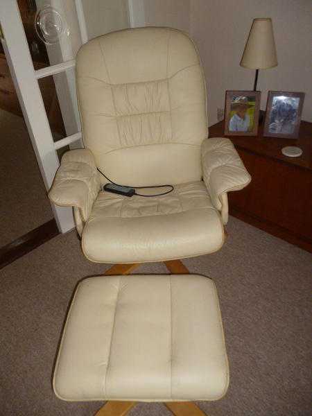 Cream revolving armchair with inbuilt massager