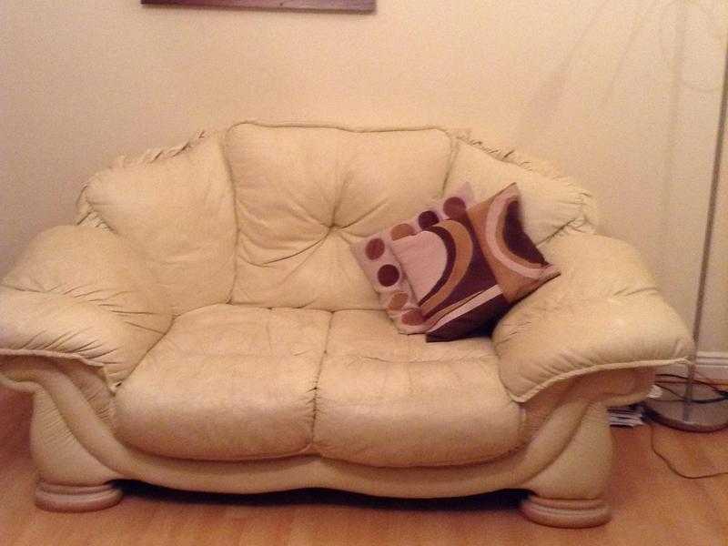 cream two seater leather Sofa