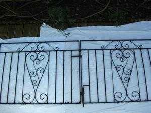 Custom made black powder coated (will not rust) wrought iron gates