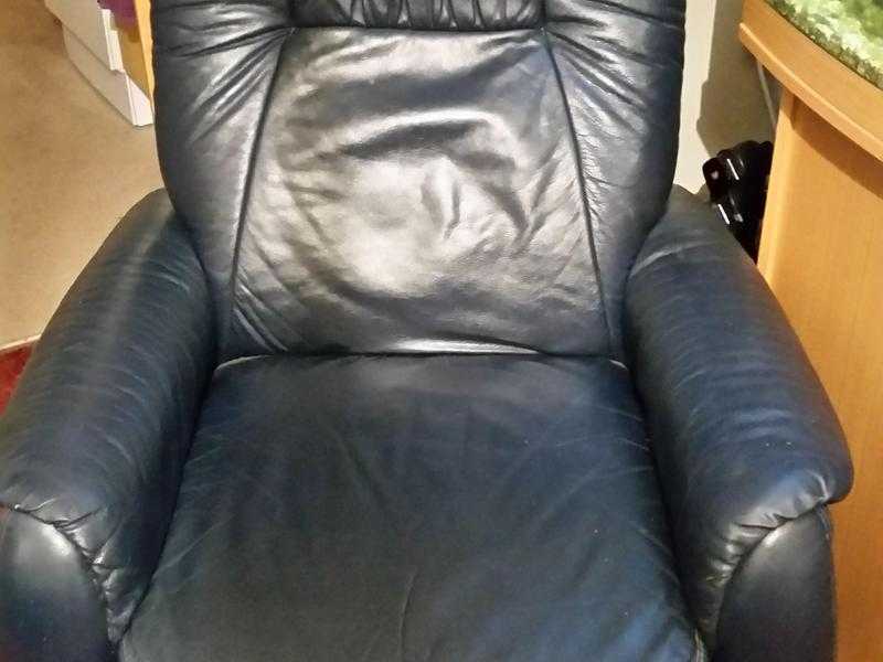 Dark blue leather electric recliner armchair