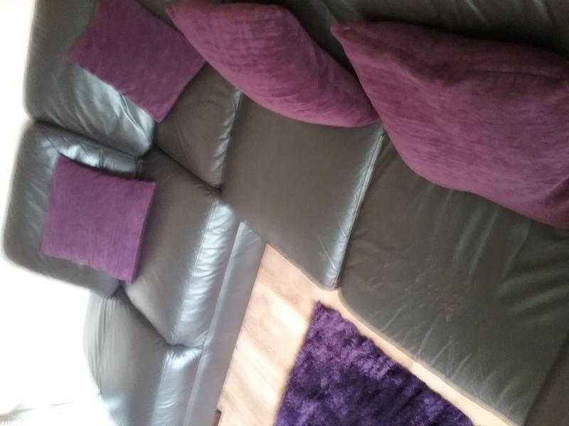 Dark brown leather right handed sofa