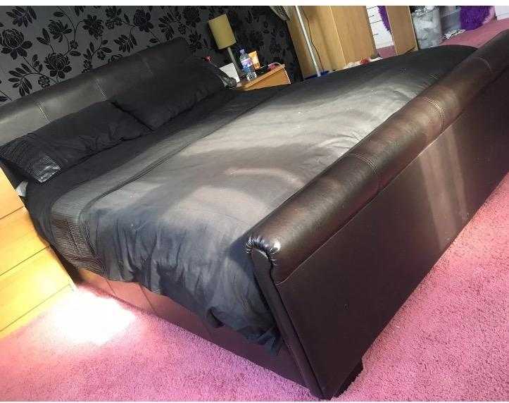 Dark brown leather sleigh bed