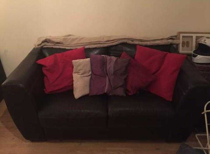 Dark brown leather sofa