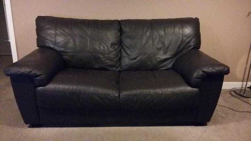 Dark brown leather sofas