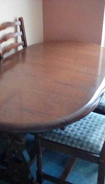 Dark oak table and 4 chairs