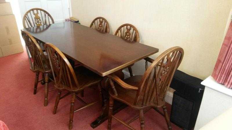 Dark wood table and 6 chairs