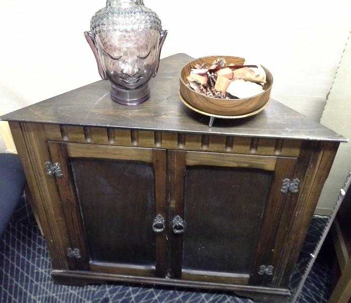 Darkwood corner cabinet.