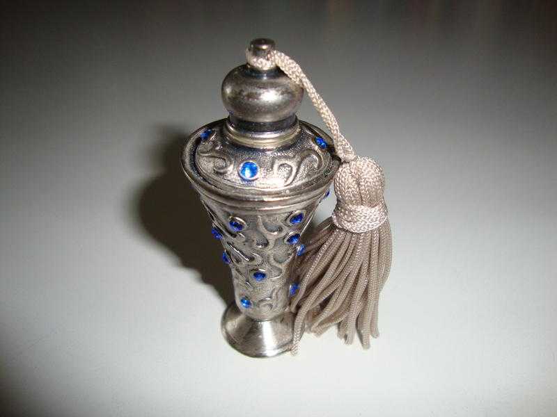 Decorative miniature perfume flask with funnel for filling