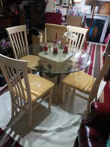 Decorative round glass table and 4 chairs