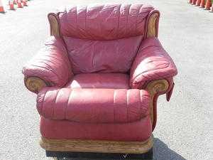 Deep red leather antique style fireside winged chair