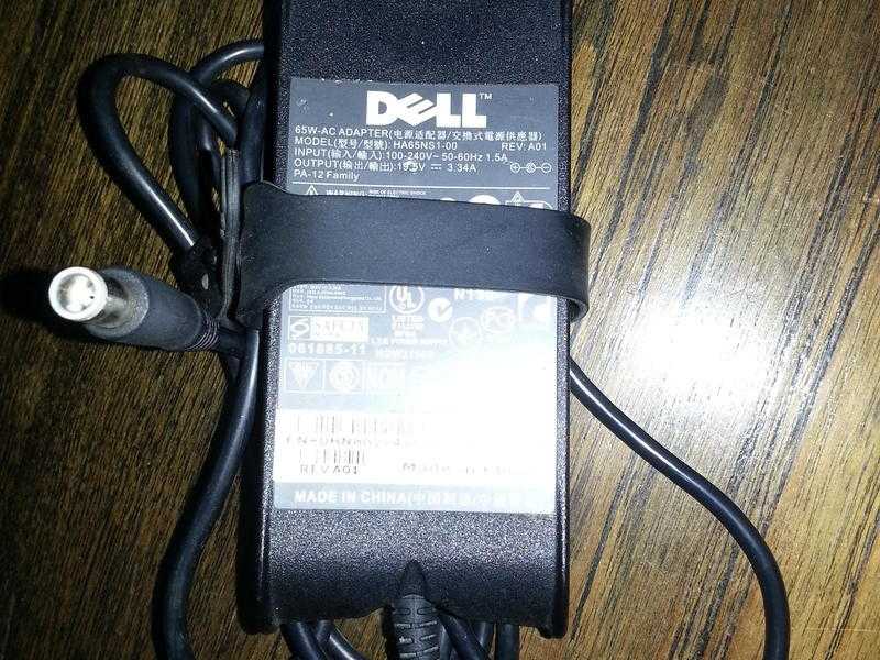 Dell HA65NS1-00 65 watt laptop ac adapter 19.5V 3.34A