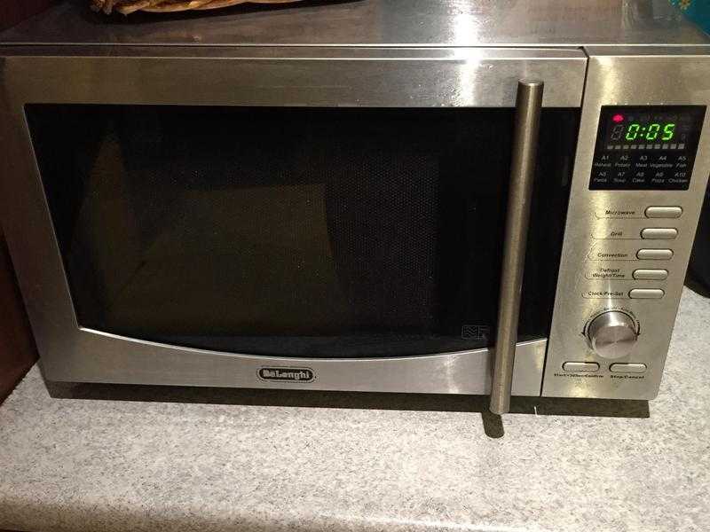 Delonghi microwave 900 watts convection oven and grill