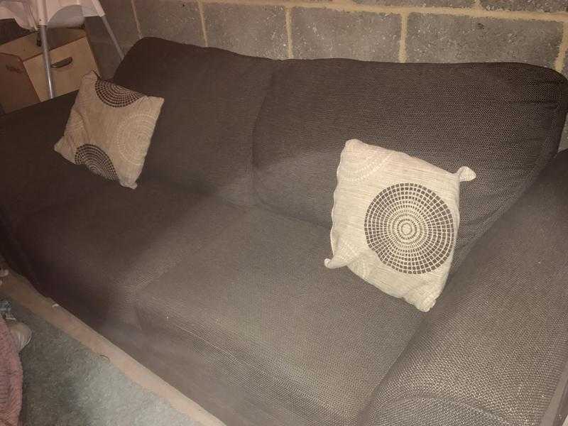 DFS brown sofa bed.