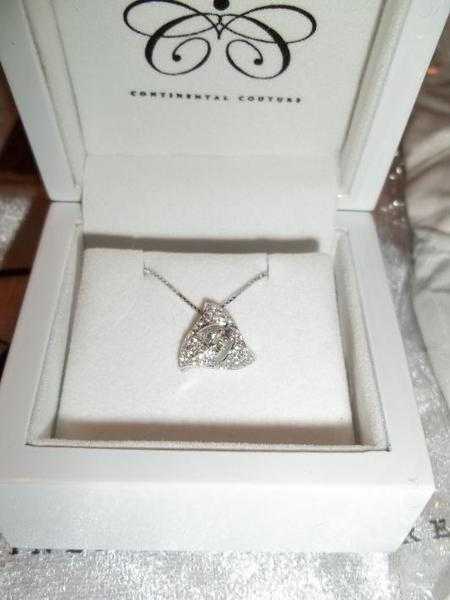 Diamond and 18ct white gold pendant brand new