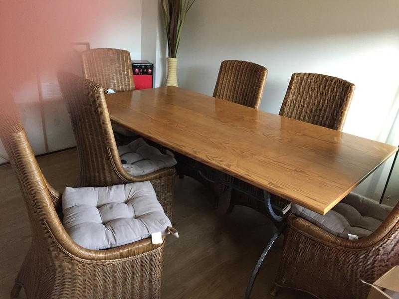 Dining room Table and Six Chairs with matching seat pads from a smoke free and pet free home.