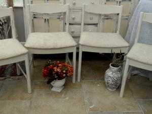 Dining table and 4 upholstered chairs