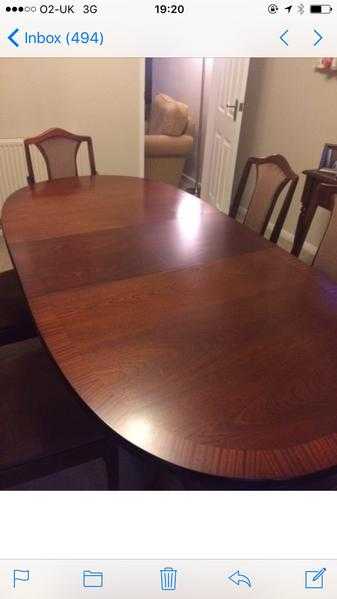 Dining table and chairs and sideboard