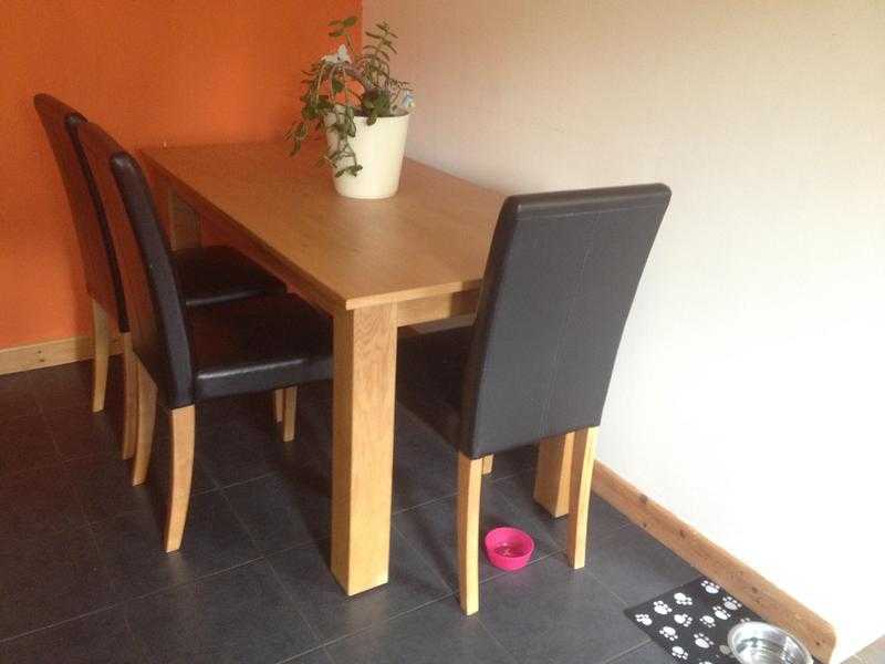 Dining table and four chairs