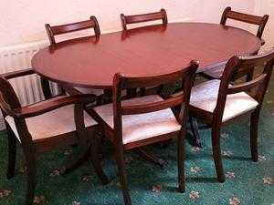 Dining table and set of chairs