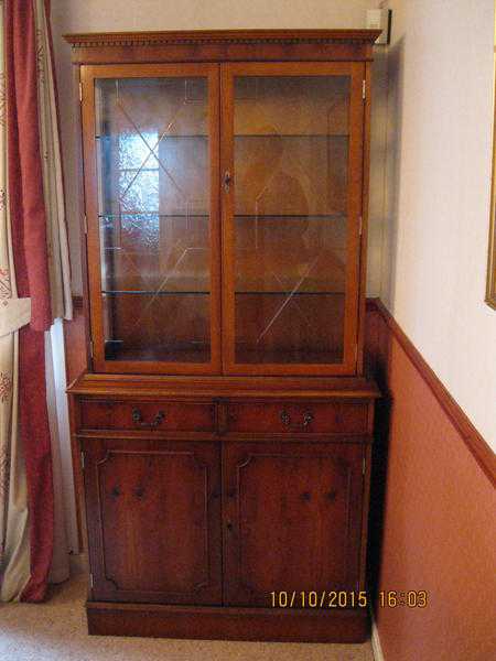 Display cabinet and base unit in reproduction yew wood.