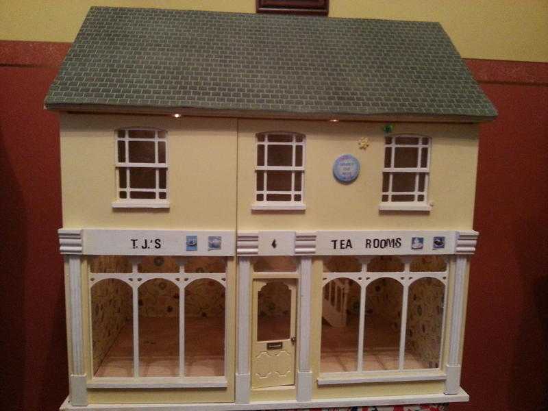 Dolls House Cafe for sale including lights to each room. Accessories available.