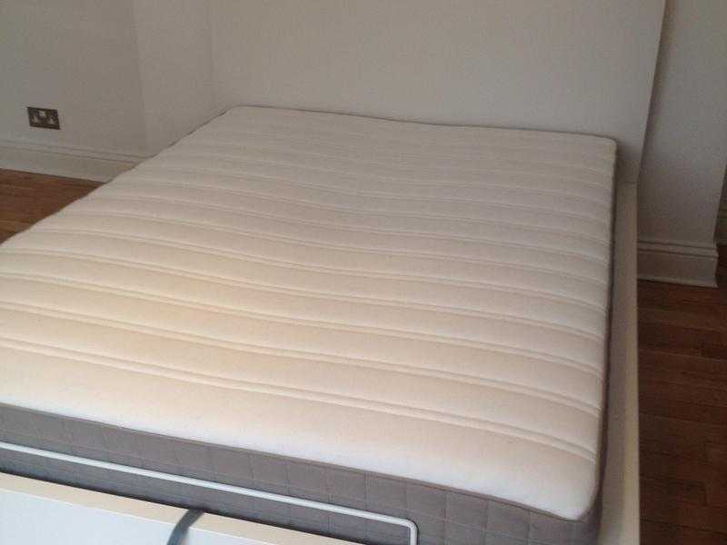 Double bed for sale. Comes with mattress and hidden storage space.