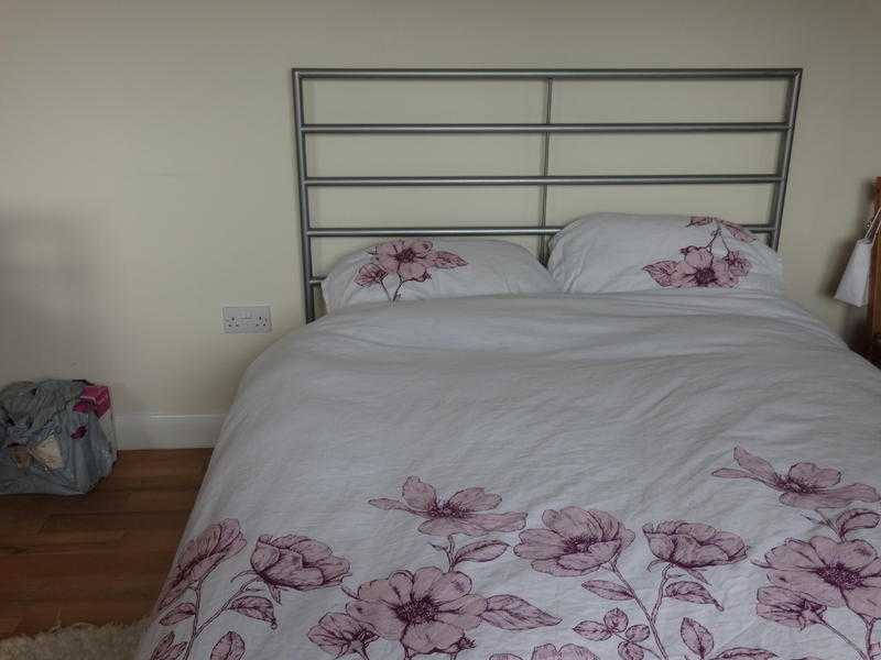 Double bed frame and mattress for sale.