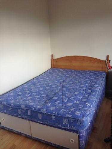 Double Bed with Mattress and Wooden Headboard