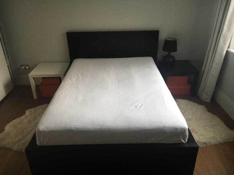 Double bed with mattress, topper and bedside tables