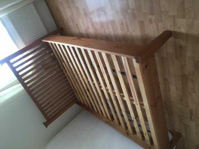 Double wooden slatted bed