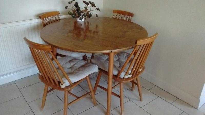 Drop Leaf wooden dining table and four chairs