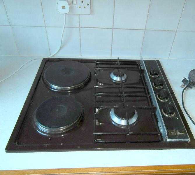 Dual fuel Hob, electric and gas burners.
