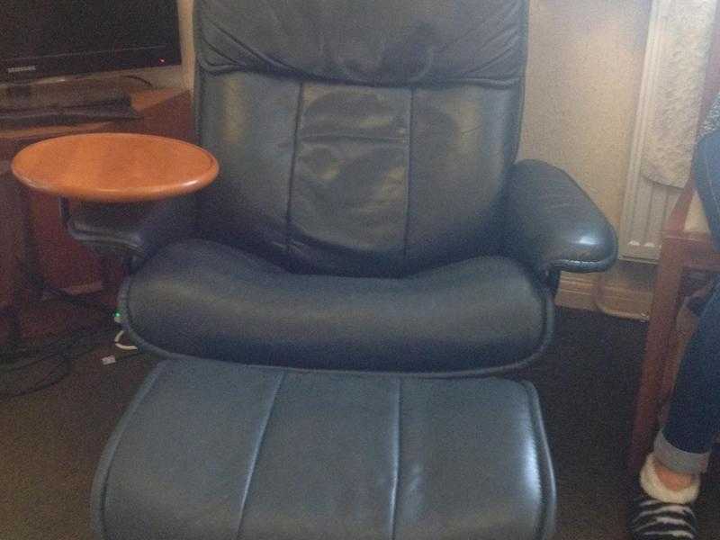 Ekorness Stressless Admiral Chair with side table and footstool.