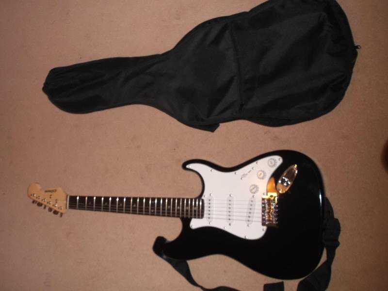Electric Guitar with strap bag stand lead and tuition book