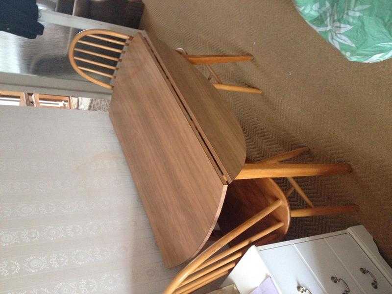 Ercol dining table and 4 chairs