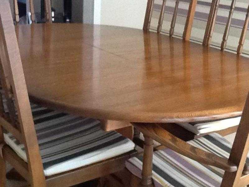 Ercol dining table plus 6 chairs