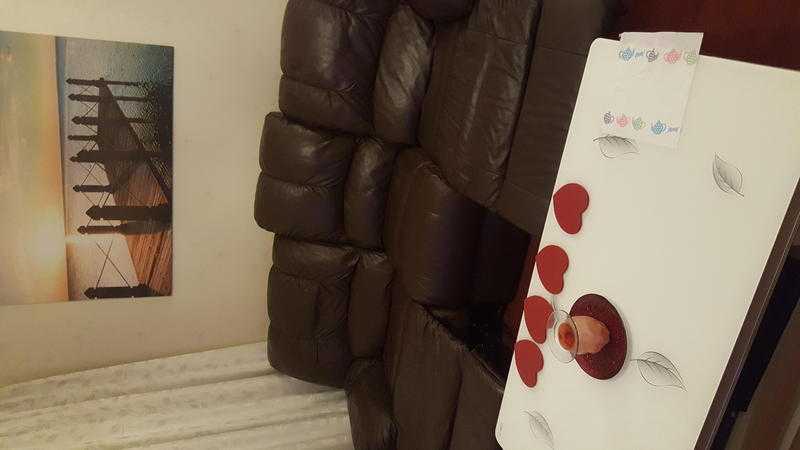 EXCELLENT CONDITION 32 SEATER LEATHER RECLINERS