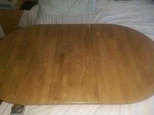 Extendable dining table