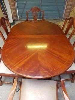 extendable dining table and 6 chairs