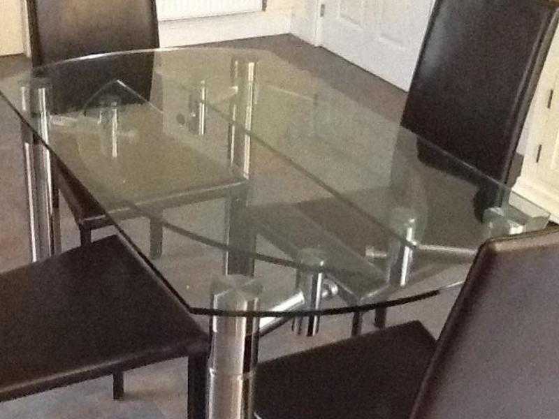 Extendable glass dining table and 4 high back leather chairs