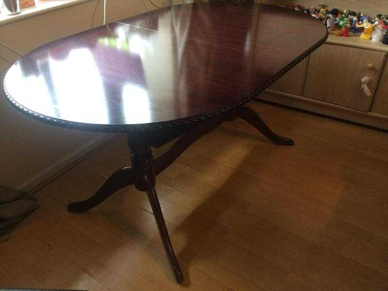 Extendable wooden table in East Finchley