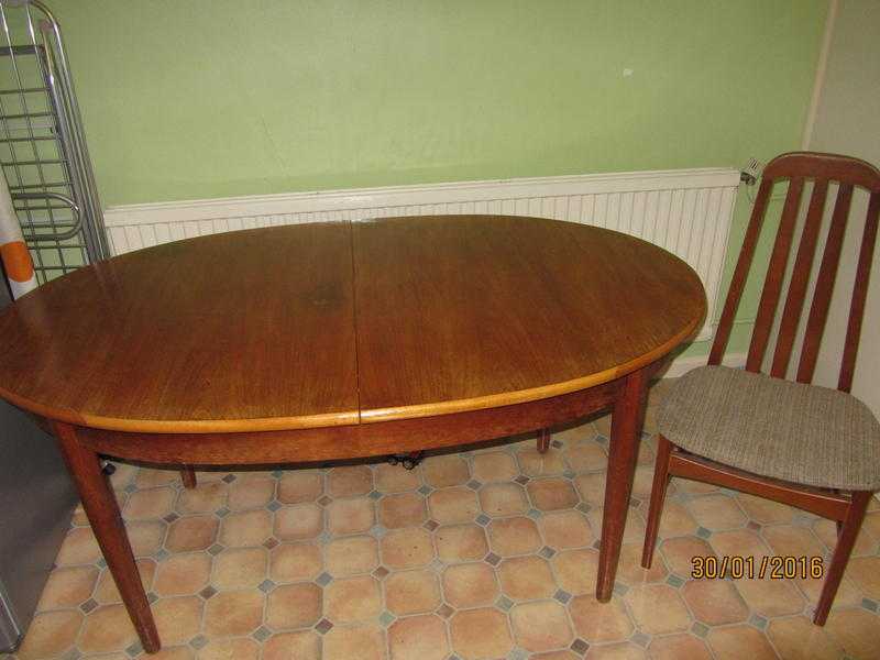 Extended dining table and 4 chairs